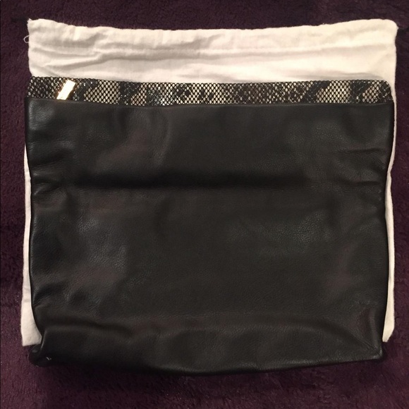 BCBG Maxazria Leather Foldover Clutch - Picture 2 of 5